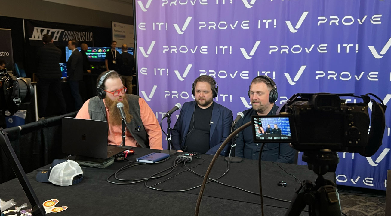 Travis Cox on a podcast at proveIt conference